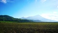 Open field with Mt. Canlaon in the back