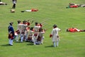 Interesting scene with several men dressed as soldiers during war reenactment, Fort Ontario, New York, 2016