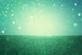 Open field view with defocused lights, or fantasy abstract background with glitter lights, cross process effect Royalty Free Stock Photo