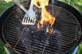 Open fire in the grill to grill a sausage with a charcoal Royalty Free Stock Photo