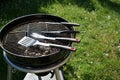 Open fire in the grill to grill a sausage with a charcoal Royalty Free Stock Photo