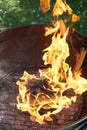 Open fire in the grill to grill a sausage with a charcoal Royalty Free Stock Photo