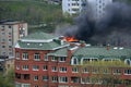Open fire on roof of a residential building