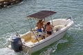 Open Fishing Boat With Black Canvas Canopy Royalty Free Stock Photo