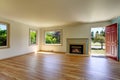 Open floor plan empty living room with polished hardwood floor. Royalty Free Stock Photo