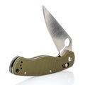 Open folding pocket knife with matte blade and textured dark green composite plastic cover plates on steel handle isolated on Royalty Free Stock Photo