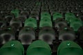 An open football stadium with empty stands with green seats. Royalty Free Stock Photo
