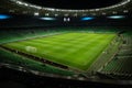 An open football stadium with empty stands with green seats. Royalty Free Stock Photo