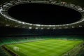 An open football stadium with empty stands with green seats. Royalty Free Stock Photo