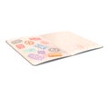 Open foreign passport with colorful immigration stamps, travel document with in perspective on white