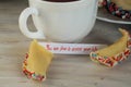 Open fortune cookie happy new year and tea Royalty Free Stock Photo