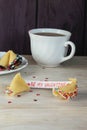 Open fortune cookie valentines day and tea Royalty Free Stock Photo