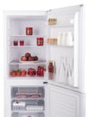 Open fridge full of fresh fruits and vegetables