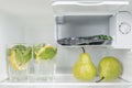 Open fridge full of fresh fruits and vegetables