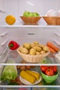 Open fridge full of fresh fruits and vegetables, organic nutrition, Royalty Free Stock Photo