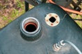 Open fuel tank with rusty neck Royalty Free Stock Photo