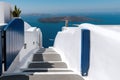 Open gate with road down to the sea at Santorini island, Greece. Royalty Free Stock Photo