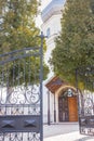 Open gate to the church yard. Doorway to christian church. Ortodox cathedral. Religious architecture. Faith and pray concept. Royalty Free Stock Photo