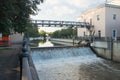 Open gateway on river in summer