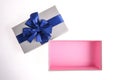 Open gift box with Blue bow isolated on white Background Royalty Free Stock Photo