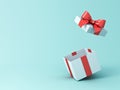 Open gift box or present box with red ribbon and bow isolated on green blue pastel color background Royalty Free Stock Photo