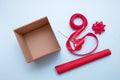 open gift box, scissors, ribbon, wrapping paper, bows to decorate it Royalty Free Stock Photo