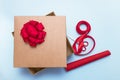 open gift box, scissors, ribbon, wrapping paper, bows to decorate it Royalty Free Stock Photo