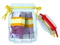 Open glass jar with bundles of euro