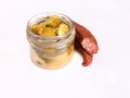 Open jar of pickled cucumbers and a smoked sausage, isolated. Pickles and a meet product, banner with a copypace. Snacks