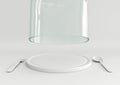Open glass lid and tray with spoon and fork on white color