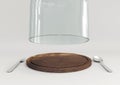 Open glass lid and wooden tray with spoon and fork