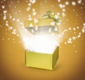 Open gold gift box with light effect