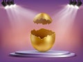 Open golden egg with shells on the podium