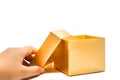 Open golden gift box hand hold