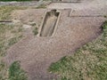 an open grave at an graveyard in england