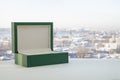 Open the green gift box on a light background. Horizontal composition with copy space. Great for gifts for Christmas  birthday and Royalty Free Stock Photo