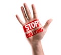 Open hand raised with the text: Stop Bullying isolated on white background