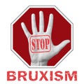 Open hand with the text stop bruxism