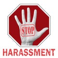Open hand with text stop harassment on a white background. Global social problem