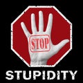 Open hand with the text stop stupidity Royalty Free Stock Photo