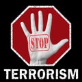 Open hand with the text stop terrorism. Global social problem