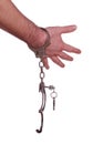 Open handcuff on hand Royalty Free Stock Photo