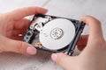 Open hard disk in female hands Royalty Free Stock Photo