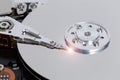 Open hard drive with magnetic disk and writing head Royalty Free Stock Photo