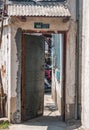 Open heavy door to house in Hutong dowtown Tongli, China