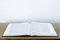 Open holy bible book on the table. Light from the book. Scripture Royalty Free Stock Photo