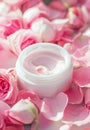 Open Jar of Luxurious Rose-Scented Cream Surrounded by Fresh Pink Petals Royalty Free Stock Photo