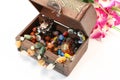 Open Jewelry Old Box with Beautiful Stone Beads Rings and Flower Royalty Free Stock Photo