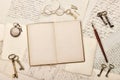 Open journal book writing items Vintage paper background Royalty Free Stock Photo