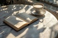 an open journal and a cup of coffee sit on a marble table Royalty Free Stock Photo